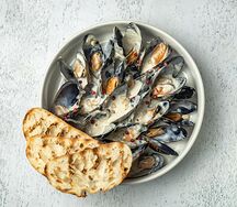 Мидии Четыре сыра