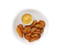 Картофель Айдахо спайси с сырным соусом