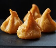 Хинкали с говядиной и свининой жаренные