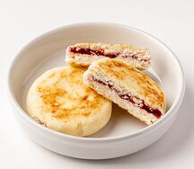 Два сырника с малиновой начинкой