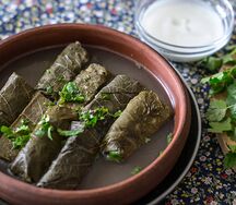 Долма из винoградных листьев с барашком и мацони