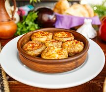 Шампиньоны, запеченные в кеци
