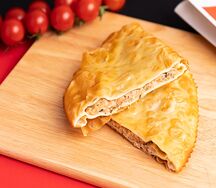 Чебурек с форелью, жареным луком и сыром