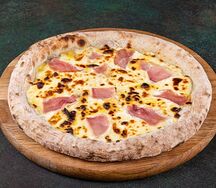 Пицца с ветчиной и сыром