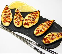 Мидии, запеченные под сырным соусом