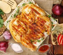 Тушка курицы на мангале