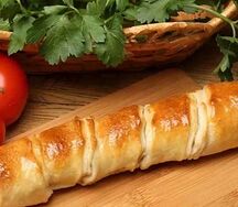 Сосиска в тесте печеная