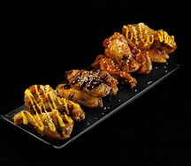 Куриные крылышки в соусе