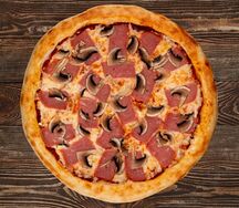 Пицца с ветчиной и грибами