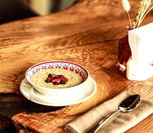 Овсяная каша на молоке с топленым сливочным маслом