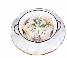 Вареники с картофелем в грибном соусе
