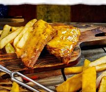 Свиные ребрышки в медового-горчичном соусе