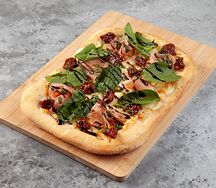 Пицца с пармской ветчиной и трюфельным маслом