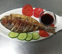 Дорадо на мангале