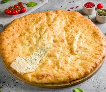 Осетинский пирог с сыром и зеленью