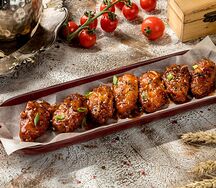 Куриные крылышки в пикантном соусе