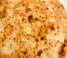 Осетинский пирог с сыром и зеленым луком