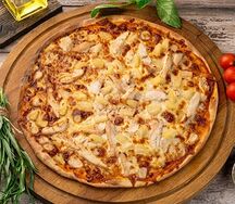 Пицца курицей и ананасами