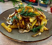 Жаренный с грибами картофель
