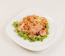 Капуста, жаренная с сосисками 