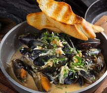 Мидии в сырно-сливочном соусе