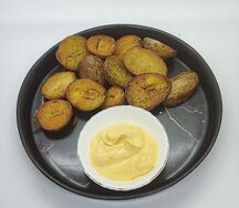 Картофель беби с чесноком в пряных травах