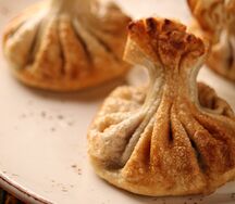 Жареные хинкали c бараниной и телятиной