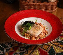 Судак с булгуром и вялеными томатами