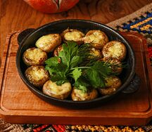 Запеченные шампиньоны с домашним сыром