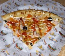 Пицца с копченой курицей