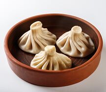Хинкали с бараниной и зеленью