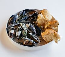 Мидии в сырном соусе