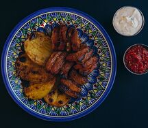 Свиные ребрышки с печеным картофелем