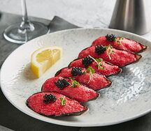 Новозеландские мидии, запеченные с пармезаном и икрой тобико