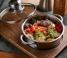 Говядина, томленная с овощами