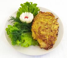 Куриный шницель в картофельной стружке