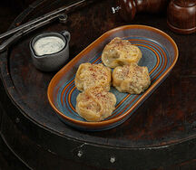 Манты с начинкой из курицы и свинины