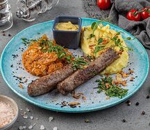 Люля с пюре и тушеной капустой