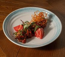 Медальоны из свинины, томленные в соусе барбекю