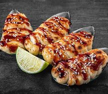 Мидии, запеченные в ракушках под чесночно-сырным соусом