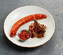 Краинская колбаска с тушеной капустой