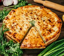 Осетинский пирог с зеленью и сыром
