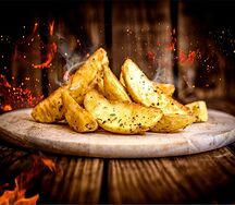 Дольки картофеля под сыром