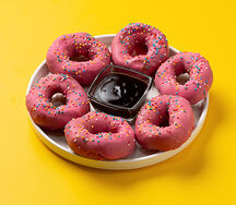 Пончики в шоколаде розовые