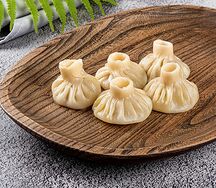 Пельмени с курицей в устричном соусе