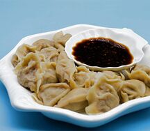 Пельмени со свининой и капустой 