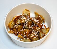 Корейские пельмешки, жаренные с соусом паназия
