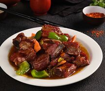 Тушеные свиные ребрышки