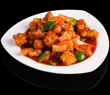 Куриное филе в кисло-сладком соусе с ананасами