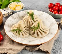 Хинкали с бараниной, говядиной и зеленью c маслом